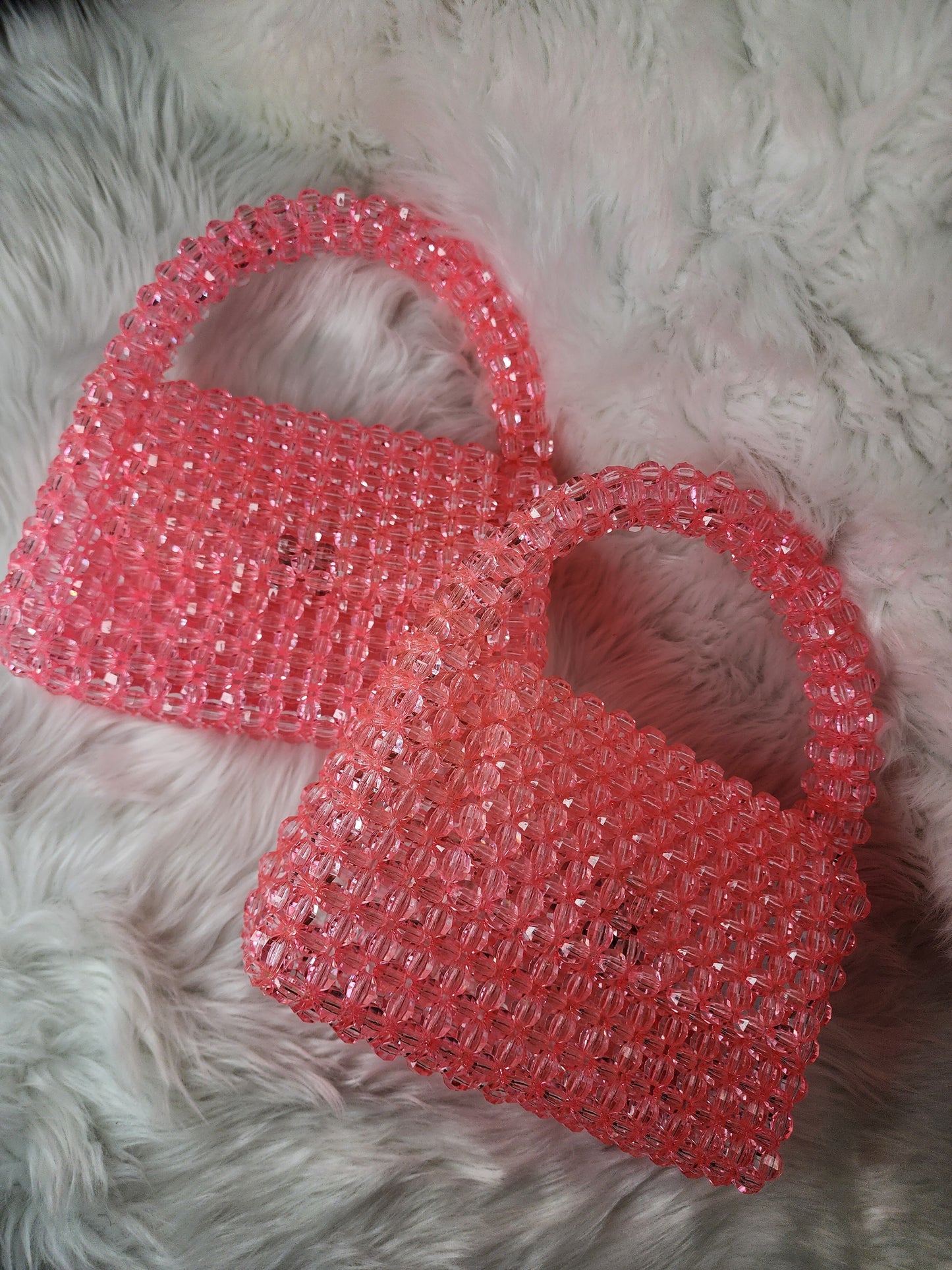 Top handle pink beaded purse